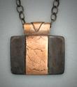 Bronze pendant with leaf veins on steel blackened with patina1" x 3/4" 18" chain.