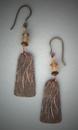 Hand sculpted Bronze earrings hanging below 3mm bone beads. L= 2 3/8�;  W= 5/8� (including ear wire)